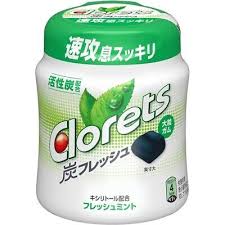 Front-facing portrait image of the Clorets Charcoal Fresh Gum Bottle (Fresh Mint, 112g) by Mondelez Japan, shown sealed on a clean white background with its charcoal and mint-themed label clearly visible.