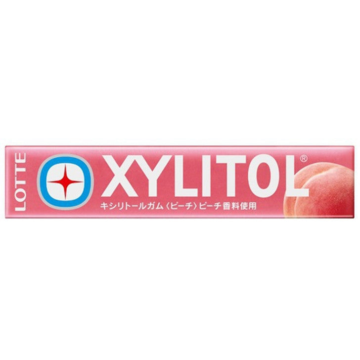 A full front-facing landscape photo of the LOTTE Xylitol Gum – Peach box, closed and lying flat, showing the complete peach-themed graphics clearly against a white background.