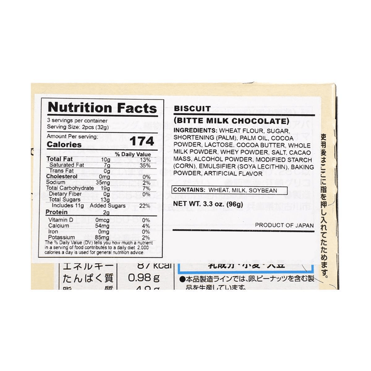 A close-up view of the complete nutrition label from the GLICO.JP Biscuit Bitte Milk Chocolate packaging, clearly showing all nutritional information.