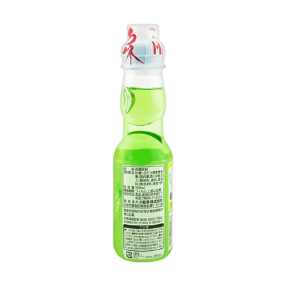 Back view of the HATAKOSEN Cantaloupe Ramune Soda 6.76 fl oz bottle, displaying product information and details on the unopened glass bottle over a white background.