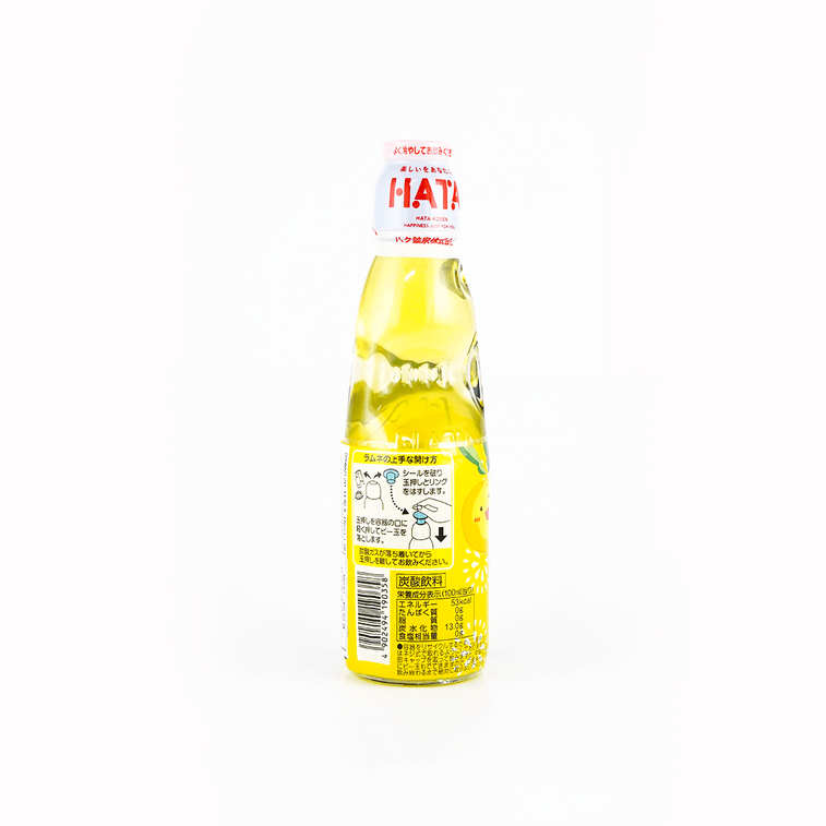 Back view of the HATAKOSEN Yuzu Ramune Soda 6.76 fl oz bottle, displaying product information and label details on the sealed glass bottle over a plain white background.