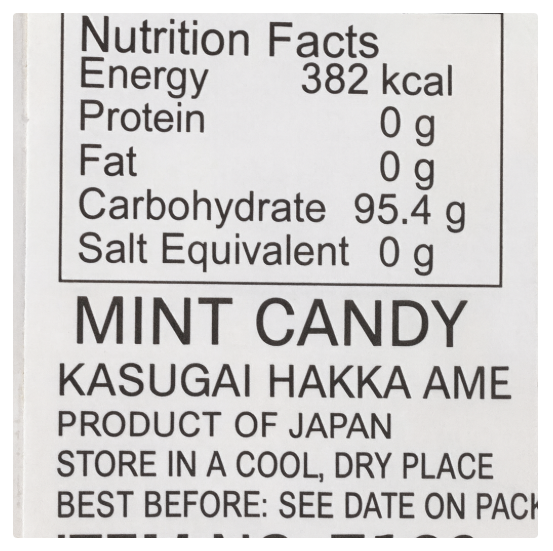 Close-up shot of the English nutrition label from the Kasugai Hakka Ame Peppermint Candy package, clearly showing ingredient and nutritional information.