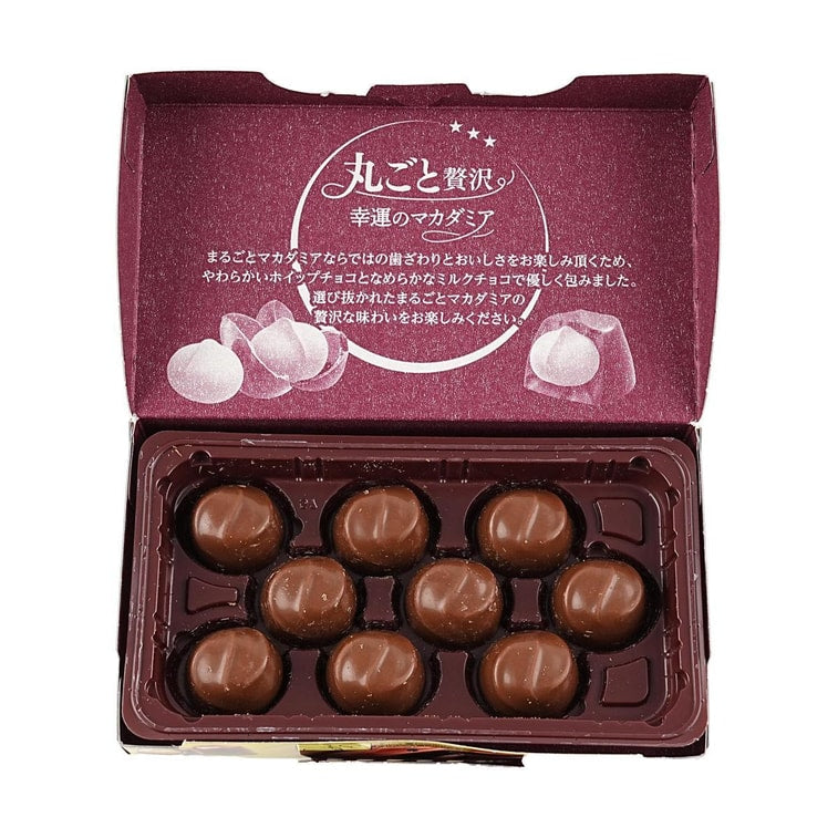 The LOTTE Japan Macadamia Chocolate 9 pieces shown outside the packaging, displaying the individual chocolates and their shape.