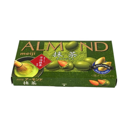 Angled landscape view of the MEIJI Almond Chocolate Matcha packaging, shown closed and clearly displaying the matcha-themed graphics against a white background.