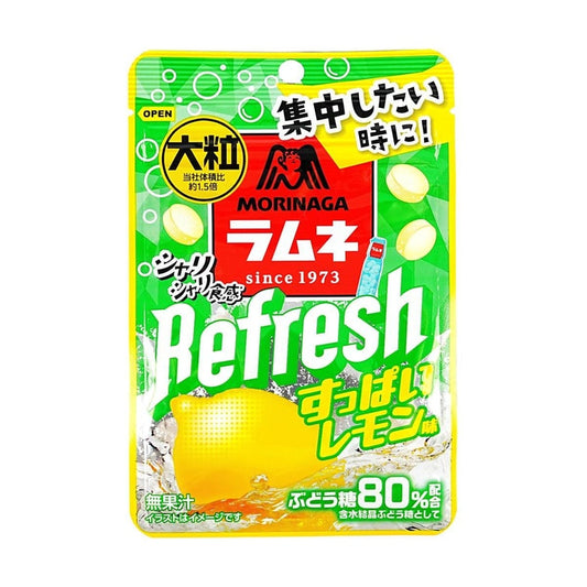Front-facing portrait image of the MORINAGA Large Ramune Soda Candy Sour Lemon Flavor 1.06 oz pouch, shown closed with full front graphics featuring lemon imagery and branding clearly visible against a clean white background.