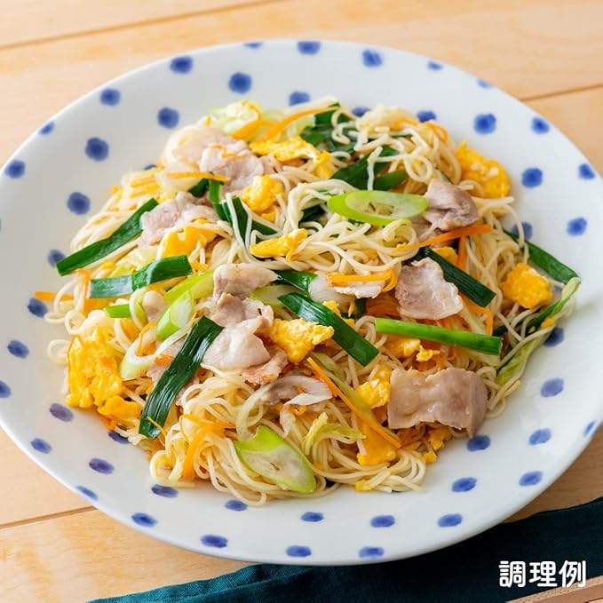 A portrait image of the NISSIN Sanuki somen noodles removed from their packaging, neatly arranged to show their thin, smooth texture.