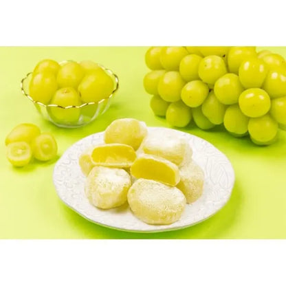 Portrait image of SEIKI Shine Muscat Grape Daifuku pieces placed in a white bowl, showing the soft mochi texture and grape-filled interior.