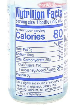 Close-up of the nutrition label from the SHIRAKIKU original ramune soda bottle, photographed clearly against a plain white background.