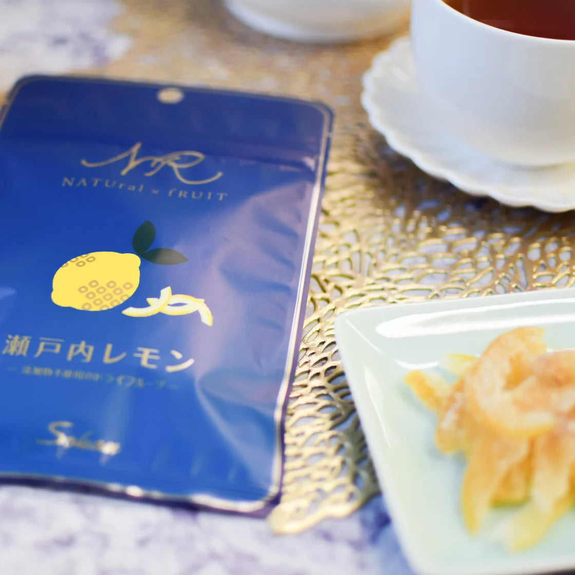 Opened SOKAN Setouchi Lemon dried fruit shown beside the unopened package, highlighting the shape and natural citrus appearance of the dried lemon slices.