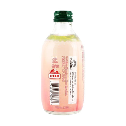Back-facing view of the Tomomasu White Peach Cider 10.14 fl oz bottle photographed in landscape orientation on a white background, showing the complete back label and product details without cropping.