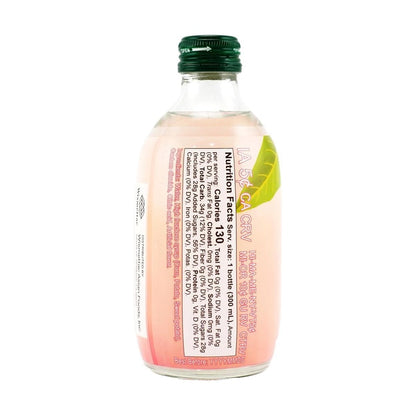 Close-up straight-on shot of the Tomomasu White Peach Cider nutrition label, shown clearly against a white background with all nutritional information fully readable.