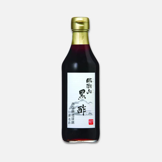 Front-facing image of the UCHIBORI Rinkosan Black Vinegar 360ml bottle, sealed and upright, showing the full label and dark vinegar contents clearly against a white background.