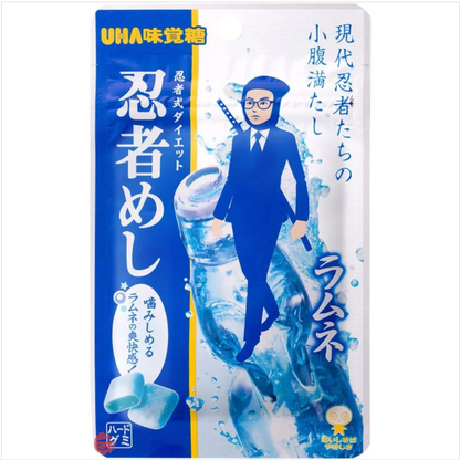 A front-facing portrait image of the UHA Ninja Hard Ramune Gummy 20g pouch, closed and lying flat with the full front graphics clearly visible against a clean white background.