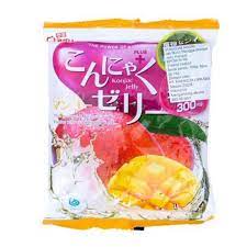 A front-facing portrait image of the YUKIGUNI AGURI mango-flavored konjac jelly pack, fully sealed and displayed against a clean white background, showing the bright mango-themed packaging and 6-piece snack format.